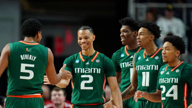 Miami (Fl) Hurricanes guard Isaiah Wong (2) high fives guard Harlond Beverly